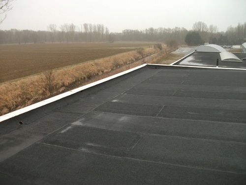 Archieffoto's zakelijk bitumen dak Killaars Steeghs Groep Reuver, pand Dr. Nolenslaan Sittard